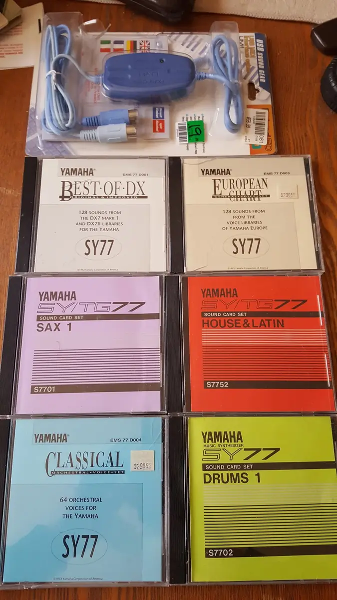 Yamaha SY77 voice cartridges laid out flat, labels reading Best of FX, Keyboard FX, Sax, Orchestral FX, Classical and Drums